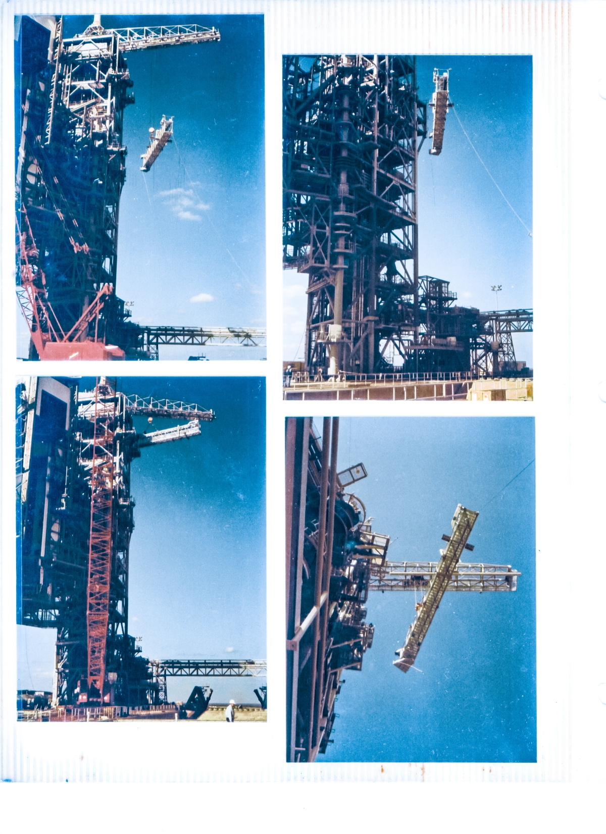 Union Ironworkers from Local 808 working for Ivey Steel at Space Shuttle Launch Complex 39-B, Kennedy Space Center, Florida, lift the 65 foot long Gaseous Oxygen Vent Arm Main Truss, into place nearly 250 feet directly above the pad deck at Space Shuttle Launch Complex 39-B, Kennedy Space Center, Florida. 